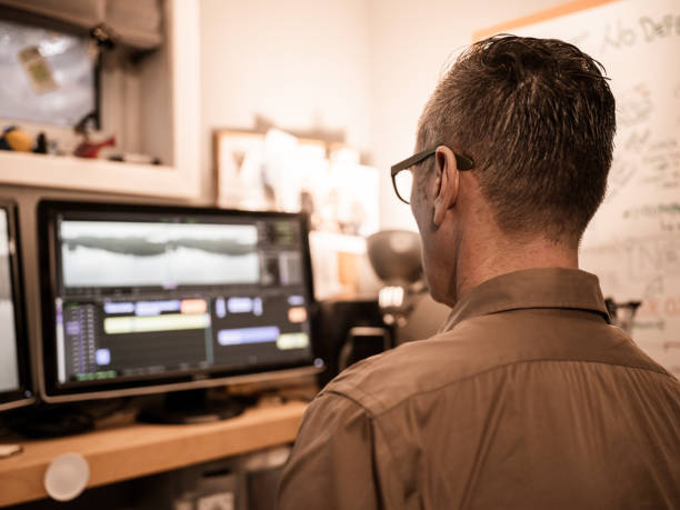 istock Male video editor working at home 1287926796