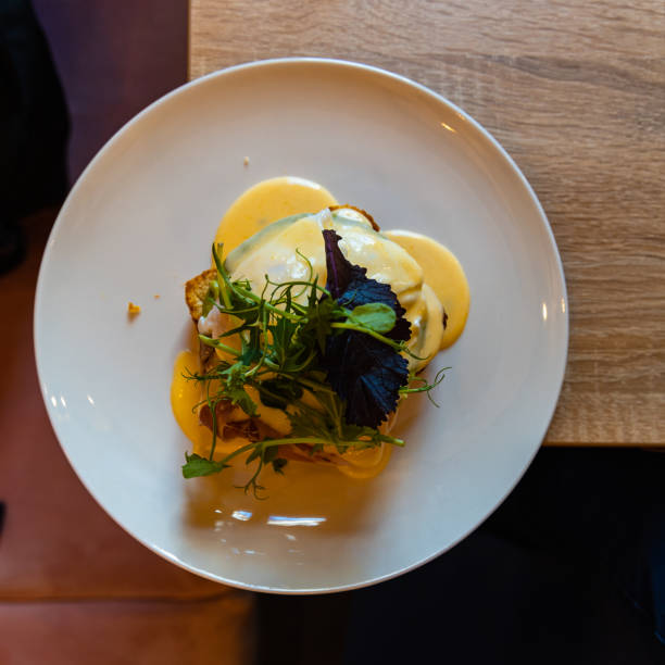 istock Toast with poached egg ham salad and sauce 1287930633