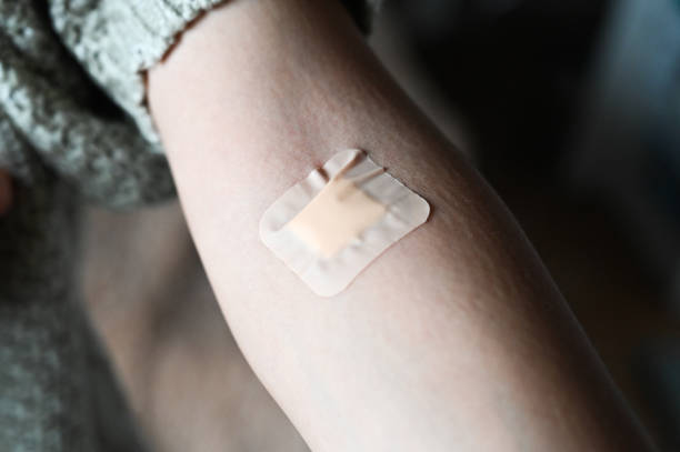 istock Plaster on the arm after donating blood 1287932085