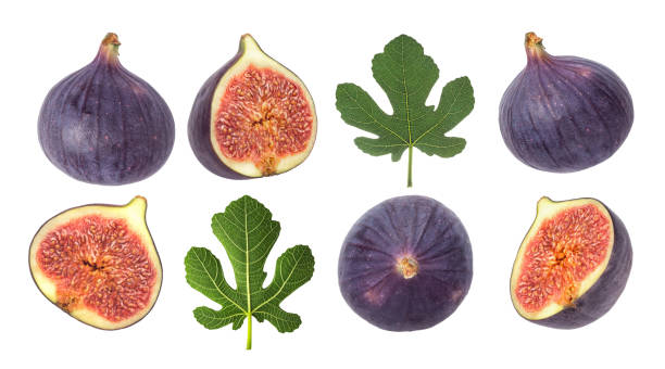 istock Set of whole and sliced figs with leaves isolated 1287936922