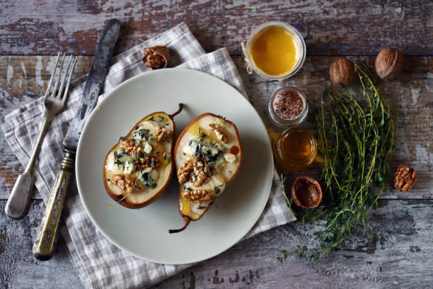 istock Baked pears with dor blue cheese on a plate. 1287936977