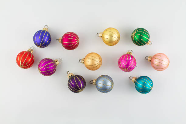 istock multicolored Christmas toys on a white background 1287939070