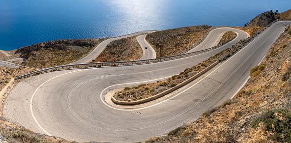 Breathtakingly steep and curvy roads climbing the coastal cliffs of the Sfakia region of Southern Crete, Greece