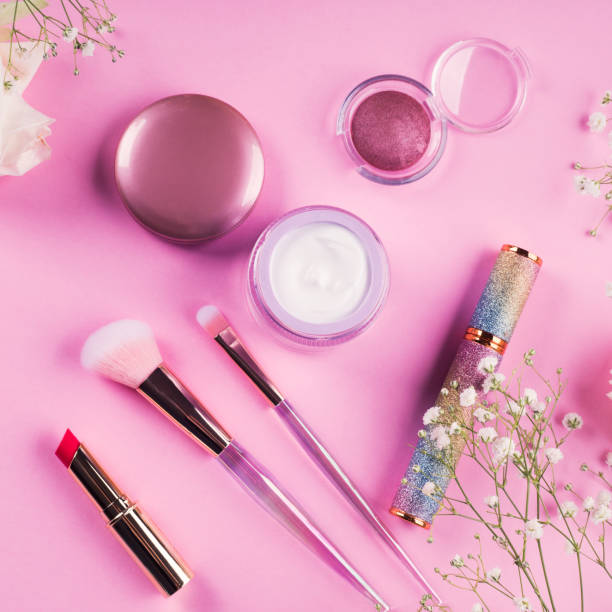 istock Shiny make up products and accessories on pink 1287943232