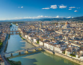 Aerial panorama of the beautiful skyline of Florence with its famous Cathedral, Ponte Vecchio, Palazzo Vecchio, Ponte Santa Trinita Bridge