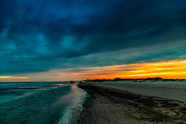 The sun setting along Crystal Beach, Texas located near Galveston just south of Houston.