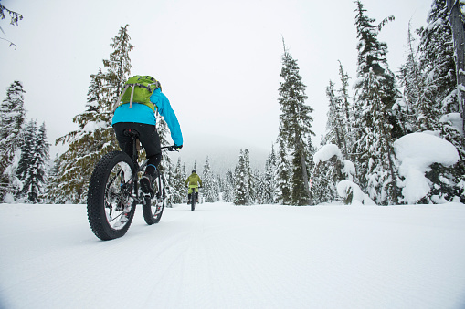 Fat biking in Whistler Olympic park in Callaghan valley.