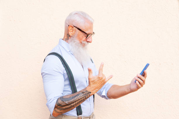 istock Senior man with a phone 1287946019