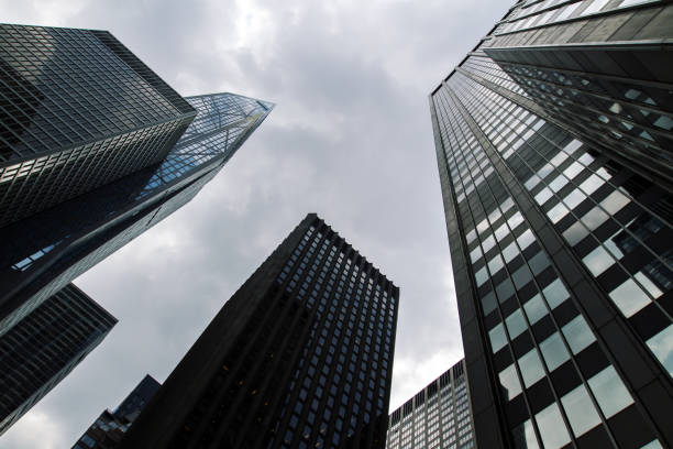 istock Bottom view of office skyscrapers 1287953303