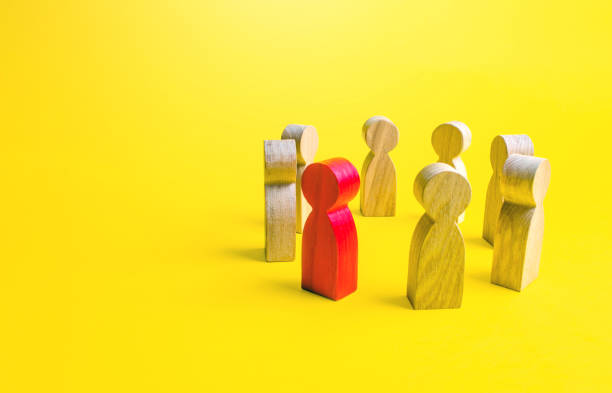 istock Red man stands with people in a circle. Communication and diplomatic negotiation process. Leader leadership qualities. Cooperation and collaboration. Spy. Social toxicity. Community dialogue. Briefing 1287957940