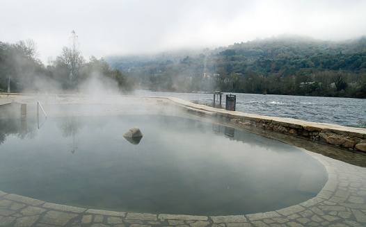 Village with white snow, nature hot springs water the best for tourist traveling in Japan at winter