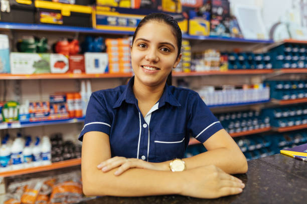 istock Young latin woman working in hardware store 1287968185