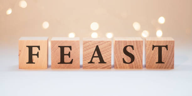 istock Feast word made with wood building blocks with lights 1287972160