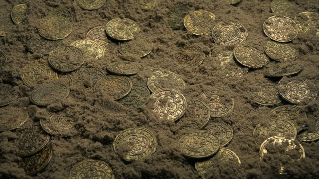 Treasure Gold Coins Mixed In The Sand After Shipwreck