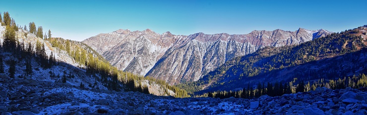 White Pine Lake views from trail mountain landscape towards Salt Lake Valley in Little Cottonwood Canyon, Wasatch Rocky mountain Range, Utah, United States.