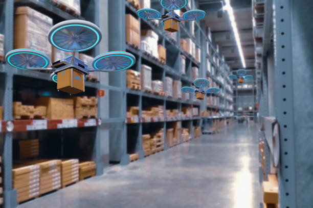 istock Concept industry 4.0 robotic drone artificial Intelligence,autonomous Robot of warehouse logistic,smart automated delivery vehicle,modern storehouse shipping,with robot carrier carrying cardboard box 1287984846