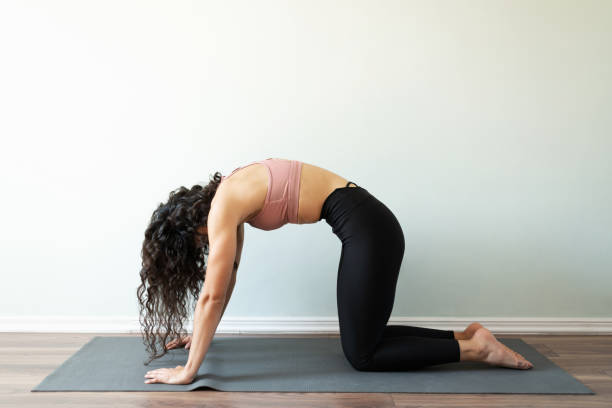 istock Athletic woman with activewar exercising with a yoga routine 1288005919