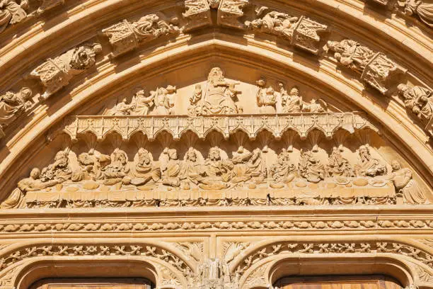 Photo of Palma de Mallorca - The stone relief of Last Supper in the south portal of cathedral La Seu by masters Pere Morey, and Guillem Sagrera Sagrera (1389 - 1394).