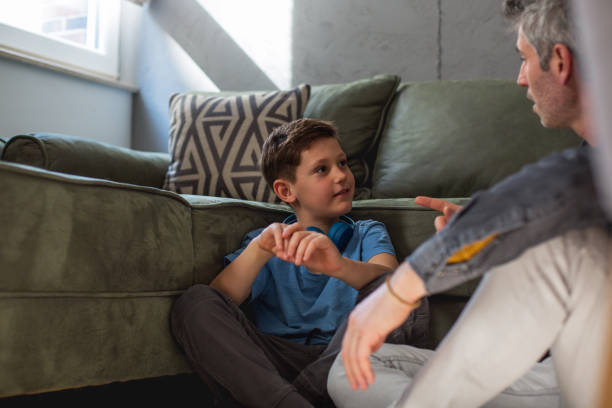 istock Son widely listens to his dad. 1288012633