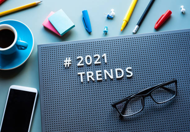 2021 trends and business vision concepts with text on modern desk.communication plan.