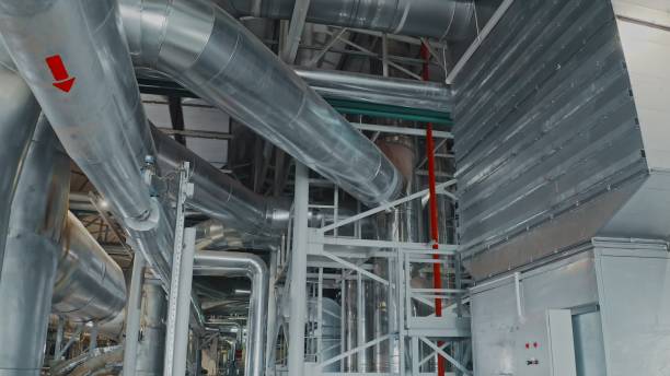 istock Large pipes in a factory 1288027541
