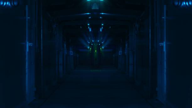 istock Running light in the hallway to the futuristic server 1288027603