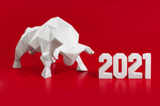 istock White volumetric paper bull on red 1288038021