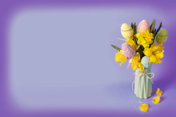 Red tulips and handmade Easter eggs on green chromakey background with copy space