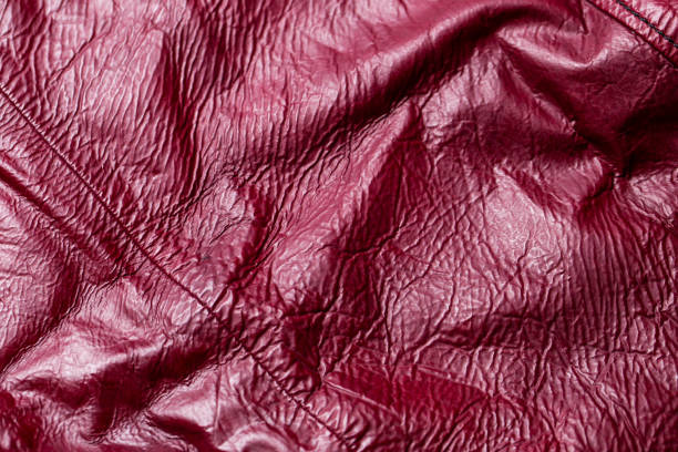 istock Close-up of a red leather texture background 1288042458