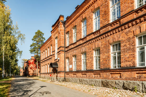 istock Beautiful vintage red brick building at sunny day 1288043591