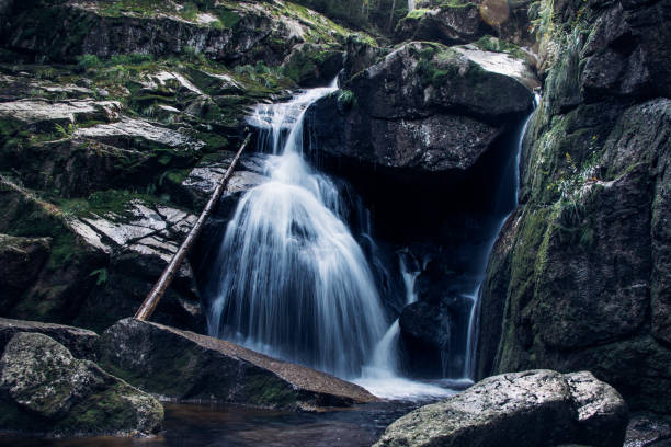istock Cold waterfall in the Jizera mountains Czech environment on the border with Poland. A source of drinking water and moisture for the plants around it 1288046730