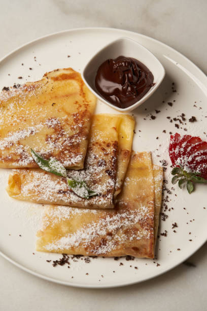istock Healthy breakfast table with Crepes, blueberries 1288056304
