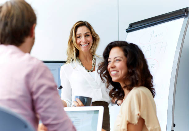 istock Coworkers meeting 1288061125