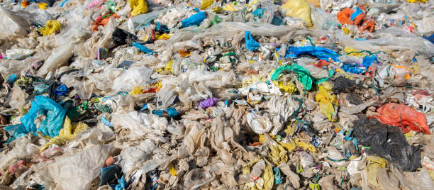 istock Pollution concept garbage pile in trash, waste dump or a landfill, waste from household, global warning 1288062155