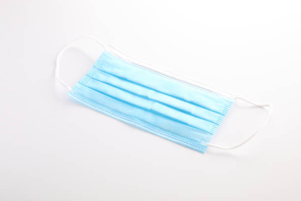 istock Used blue mask isolated in white background 1288064483