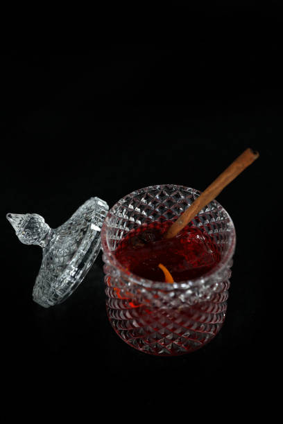 istock Pink Cocktail glass with ice at a bar counter 1288065192