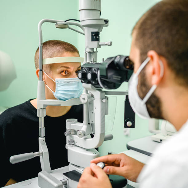 istock Woman having an eye exam at ophthalmologist's office 1288066488