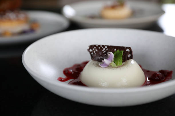 istock Panna cotta dessert with strawberry sauce 1288067391