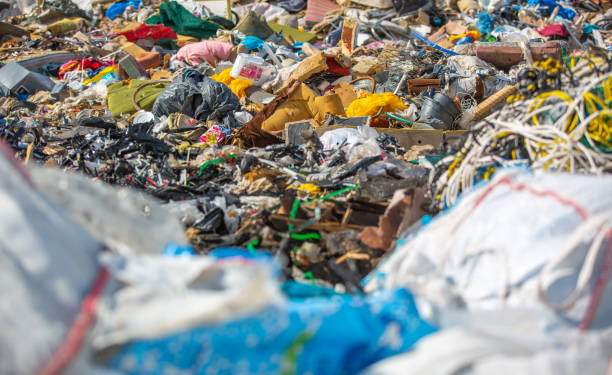 istock Huge landfil or waste dump from household, ecology issue 1288067622