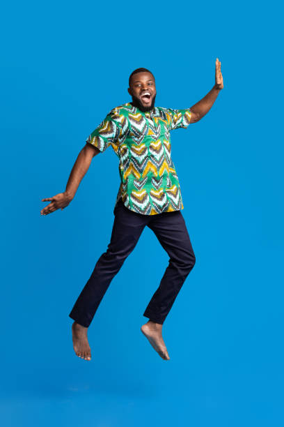 istock Smiling african american guy having fun, wearing traditional clothes 1288067649