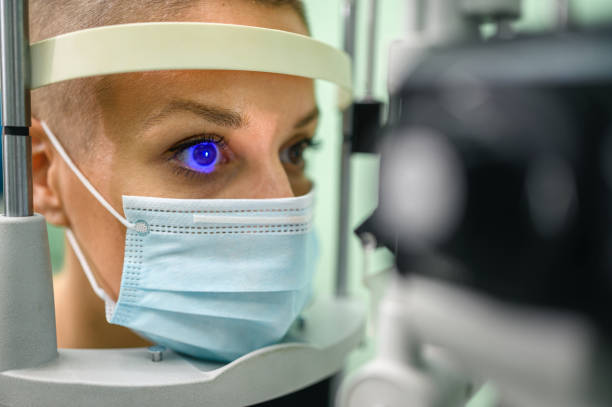 istock Woman having an eye exam at ophthalmologist's office 1288068209