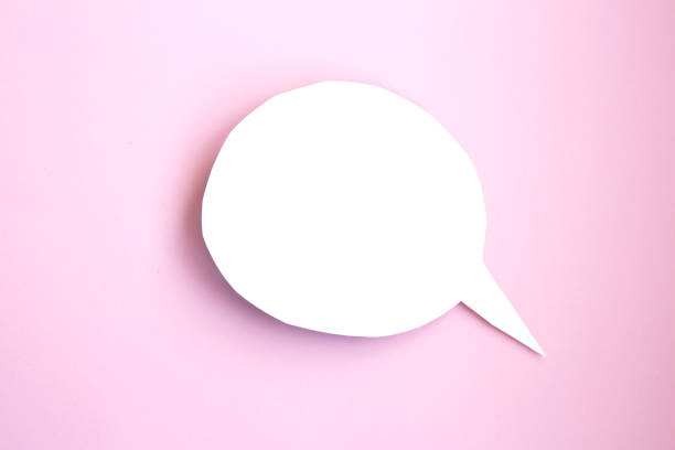 istock White paper speech bubble with clipping path on bright pink background 1288069626