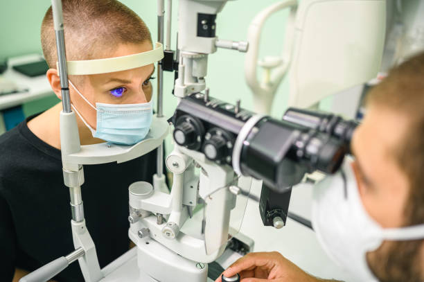 istock Woman having an eye exam at ophthalmologist's office 1288069683