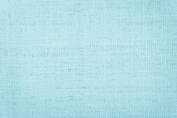 istock Pastel Blue abstract Hessian or sackcloth fabric or hemp sack texture background. Wallpaper of artistic wale linen canvas. Blanket or Curtain of cotton pattern with copy space for text decoration. 1288070610