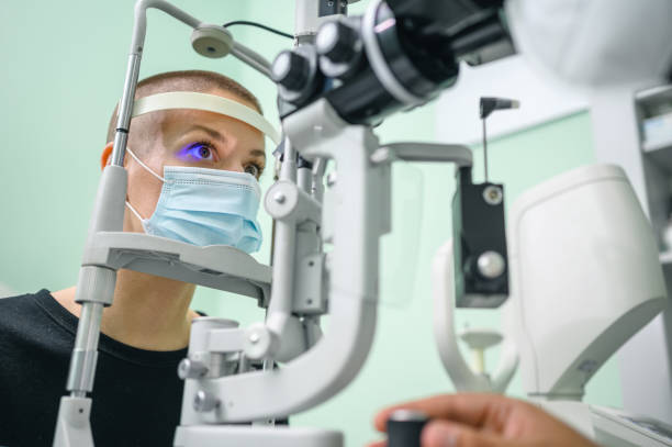 istock Woman having an eye exam at ophthalmologist's office 1288072646