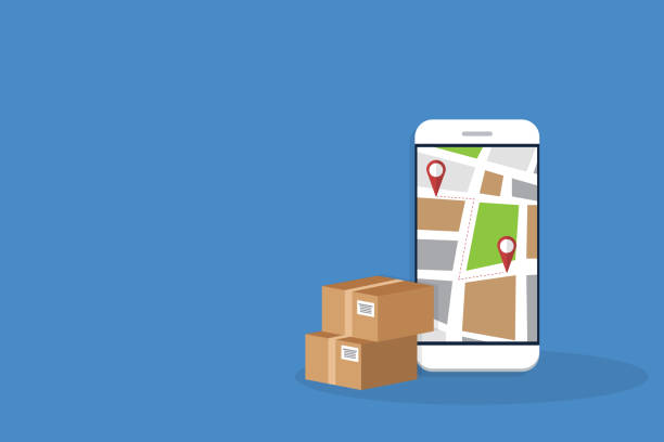 istock Delivery. Parcel delivery tracking on mobile phone. Smartphone with city map on screen and pin pointers, destination location with packaging boxes. 1288073377