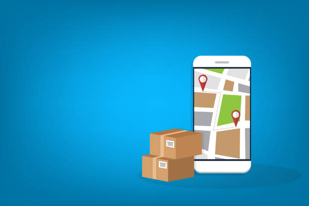 istock Delivery. Parcel delivery tracking on mobile phone. Smartphone with city map on screen and pin pointers, destination location with packaging boxes. 1288073445
