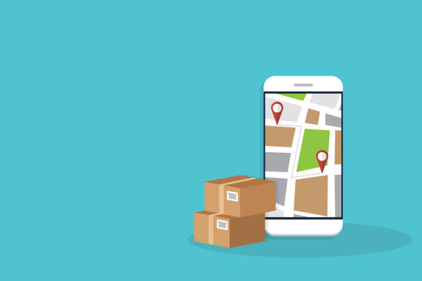 istock Delivery. Parcel delivery tracking on mobile phone. Smartphone with city map on screen and pin pointers, destination location with packaging boxes. 1288073582