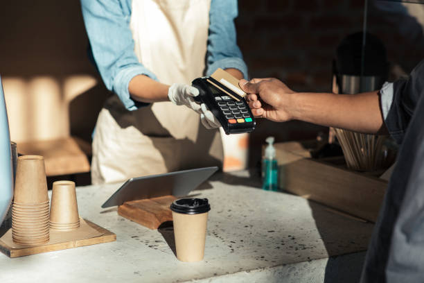 istock Pay for takeaway coffee at social distancing 1288073860