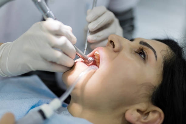 Female patient having dental treatmant at dentist office Female patient having dental treatmant at dentist office root canal stock pictures, royalty-free photos & images